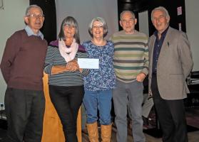 The winning team receiving their prize from President Reg Dunbar