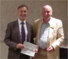 Andrew presents cheque to Richard Goode of Nerve Tumours UK