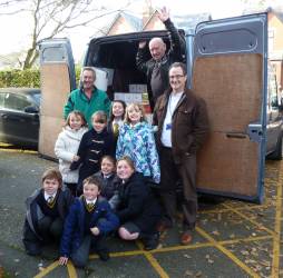 Children and staff of Churchtown Primary School Southport with Rotarians and a van load of shoeboxes!