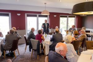 District Governor Alan Clark proposed a toast to, The Rotary Club of Halstead