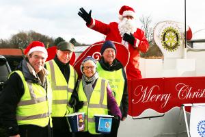Santa on tour with Rotary York Ainsty Rotarian 'collection Elves' - Peter Kendall, John Merchant, Christine True and John Niklaus.