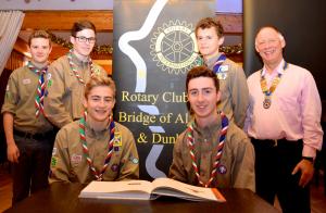 President Nick Rawlings with Scouts from the Forth Valley District. The Bridge of Allan and Dunblane Rotary Club made a contribution of Â£250 towards the Scouts"™ project in Namibia. In June of next year the Scouts will help in the building of a kinde