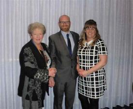 President Christine Folley with Paul Harris and Heidi Waterhouse - presenting a cheque for the charity funds.