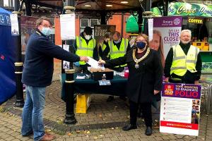 Purple for Polio - Brigg Receives Donation from Mayor Sharon Riggall for its work