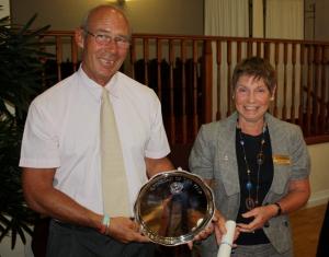 Rotarian Shaughn Arkwell is presented with his award