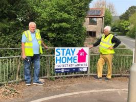 The Club erect Stay at Home signs