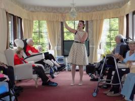 Singer entertaining residents at Bryony House