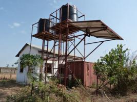 The solar panels and water tanks