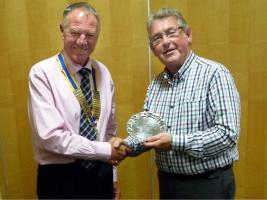 David Landy accepts the Southport Links Golf Trophy from President Geoff Bigg