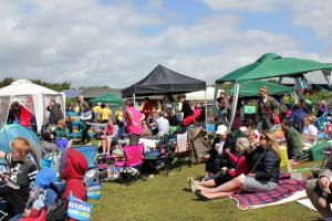 Spectators on the grass bank 