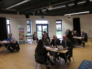 The interviews underway at separate tables in the main school hall 