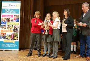 The winning team, St Mary's Purton, receive the cup