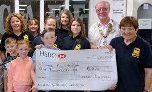 Olver Johnston and Georgina Yates at St Joseph's Roman Cathlic Primary School Darwen, were delighted with the Pictorial Dictionaries presented to the school by the Rotary Club of Darwen