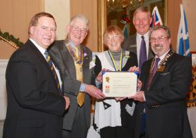 Dec 2012 Rotarian Sylvia Kelly receives an early Xmas present