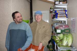 Terry Glossop handing over the Eynsham donations to Jayson Marc-Fraser at Gatehouse