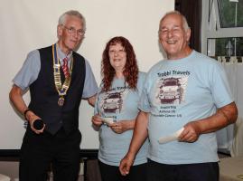 President Trevor presents the cheques to Steve & Barbara