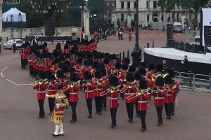 Guards band walking towards Buckingham Palace