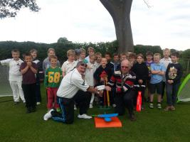 Cricket club receives funding for coaching equipment.