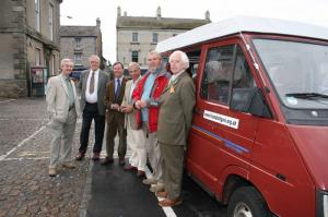 With the vehicle are from left: Rotarians Chris Wheatley, John Ogbourne, Barry Whitfield, Bob Hughes, David Pointon and Derek Langley