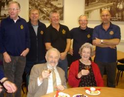 Members of the Rotary Club with two guests