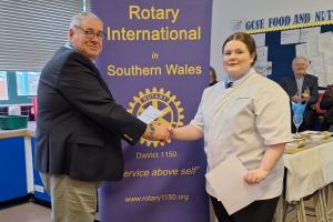 DG Malcolm congratulates winner Lena