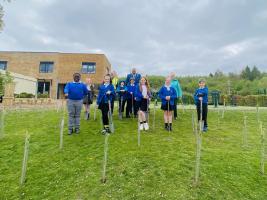 Proud pupils admire their work with Bolton Lever Rotarians