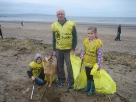 Stuart, Leo and Nina Brockie lend a hand.