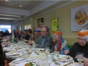 Elders, Students and Rotarians enjoy a Christmas Dinner together