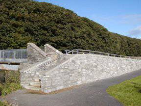 The ramps and steps to the cemetery bridge over the Thurso River.