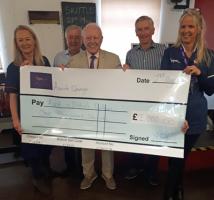 Ascot Grange Care Home presenting a cheque for £1,000 to Club President