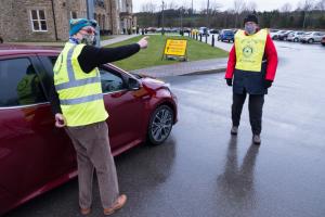 Wensleydale Rotarians John Morton & David Blakeley guiding arrivals