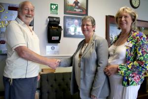 Defibrillator being presented for siting at Moor Lane Sports Centre