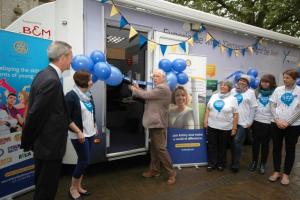 Rotary President Steve Holborough opens the Mobile Dementia Exhibition  in Witney Market Square