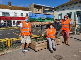 Andy, Ian and Di proudly display one of the updated planters.