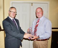 Mike Keene vice-president elect of Thornhill and District Rotary Club presents Sinclair Barbour with Rotary’s service in the community award.