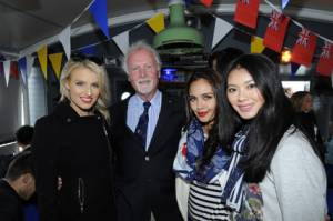 A Presidents Life is so hard!  

President (2014-2015) Geoff Coop with Miss 

President (2014-2015) Geoff Coop with Miss Australia on his right, Miss World (Miss Philippines) and Miss China on his left.  Occasion was 70th Anniversary celebrations on 8