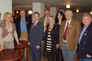 Members proudly displaying their Tree of Light lapel ribbons