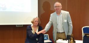 Simon Carter handing over to Julia Willetts