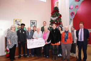 Interact presents cheque to the Fair Close Centre