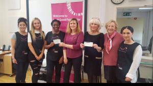 Our inner tube members donating £460 to