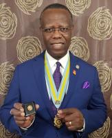 Asst. Governor Ken. Abiodun received Paul Harris Fellowship (PHF) by the 2020-21 DG Recognition Award 