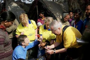 Rotarians with pupils from Falklands Primary School, collecting Shoeboxes