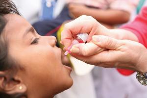 A young child receives the polio vaccine 