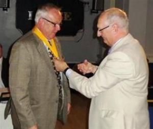 President George present the insignia to SVP Gerry Harrington & JVP Ray Needham as they take up their new posts