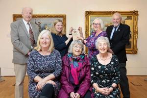 Rotary Shop presents Stanhope Forbes ‘playing card’ to Penlee House Gallery & Museum.