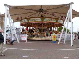 Enjoying the Carosel at Southport Pier