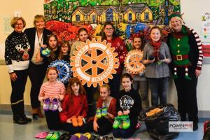 Pupils from Narberth Junior School Rotakids Club  are pictured with the shoes and sandals they collected for their compatriots at the Roko 20 School in Kenya