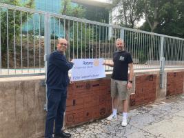 Rtn Gareth Scott presnts cheuqe to Adam Sherring of Kingsbridge Skatepark