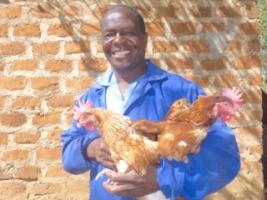 A member of the local village with just 2 of the flock.