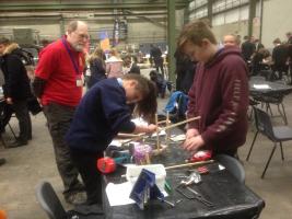 Rtn David Spashett watches a group work